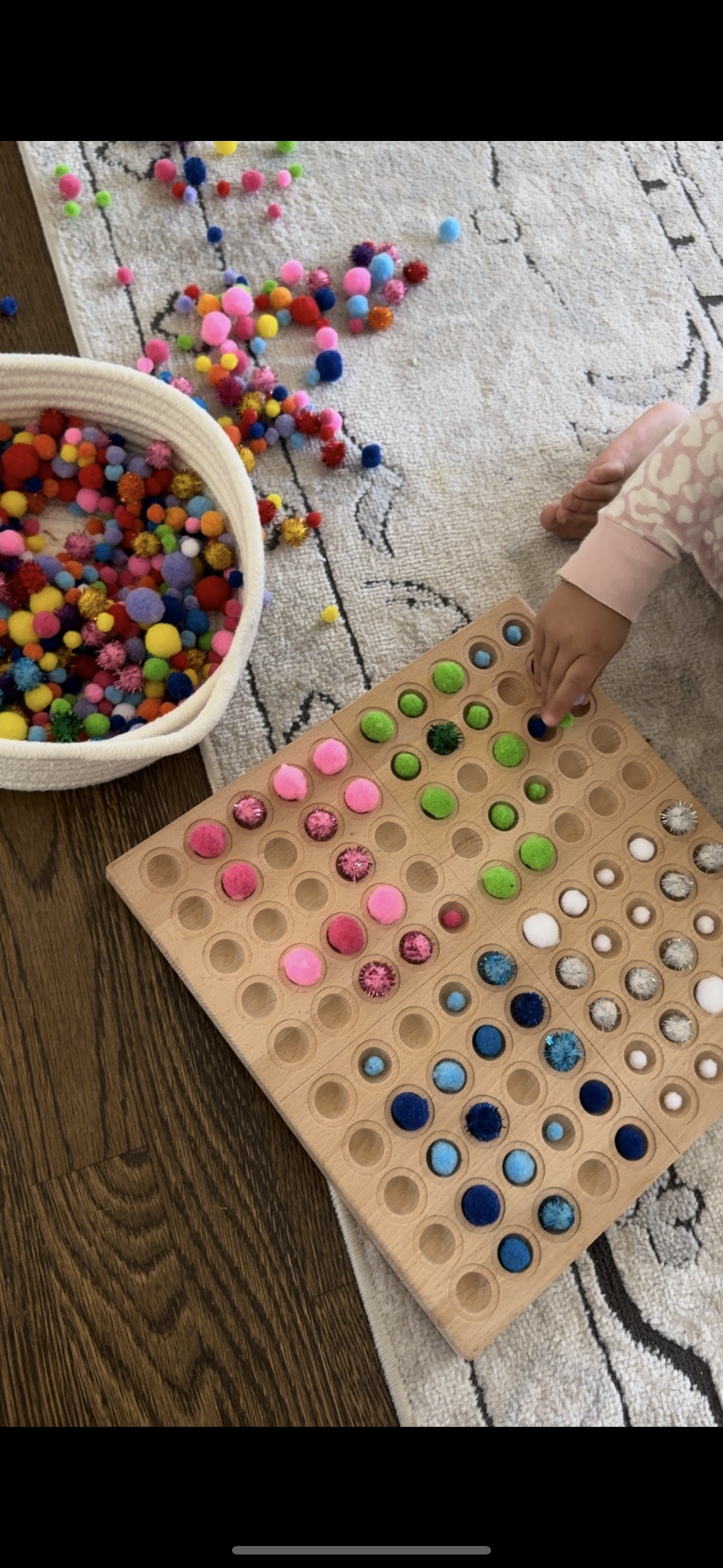 montessori board teaching muslim kids the 99 names of Allah and arabic numbers